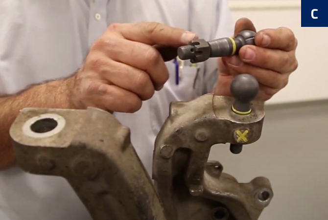 Ball joint with castle nut going past cotter pin hole.