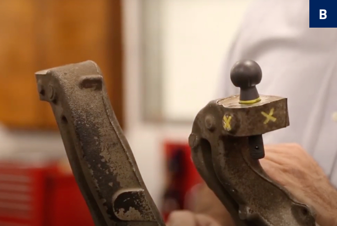 Ball joint in a damaged steering knuckle.
