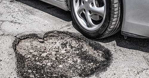 car-and-potholes-thumb car-and-potholes-thumb