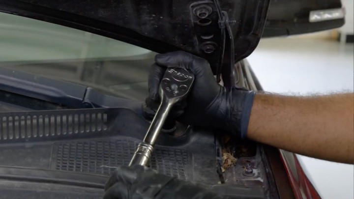 Removing vehicle air inlet grille Removing vehicle air inlet grille